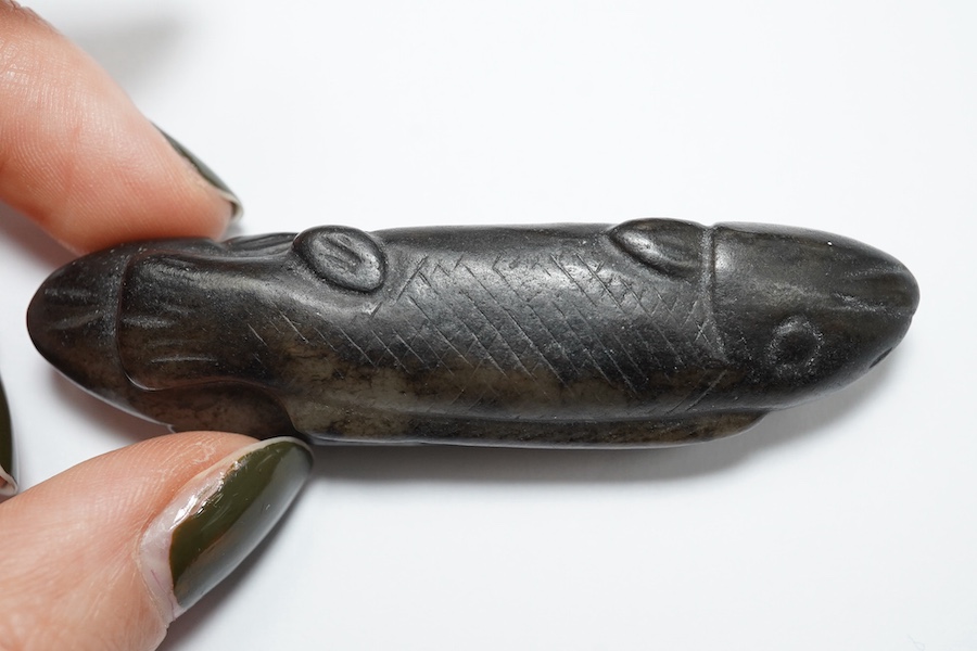 A Chinese black and white jade 'fish' sword fitting, Song or later